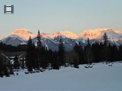 Banff Time Lapse Winter Moonset and Sunrise on  Mount Bourgeau, Mount Brett, Massive Mountain and Pilot Mountain From Bow River bridge.mp4